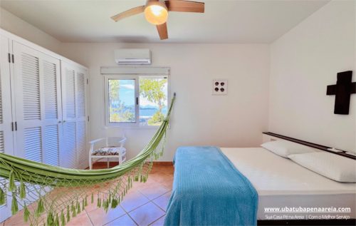 Suíte 1 com cama de casal e rede
